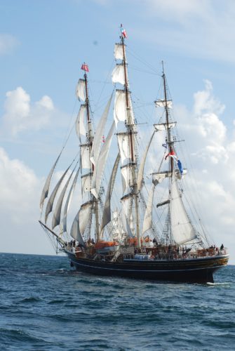 A Clipper ship with full sails on open sea, representing 17th-century tea trade routes and maritime journeys explored in A History On Tea.