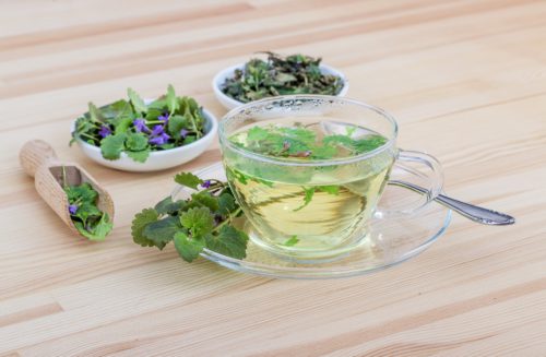 Fresh herbal sleep tea with lemon balm and lavender, one of the most gentle and effective natural sleep remedies to soothe the mind.