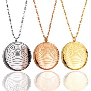Stylish EMF protection pendants in silver, rose gold, and gold, designed to reduce radiation health effects from electronic devices.